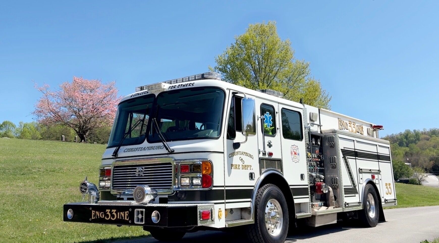 Firefighter in front of white truck